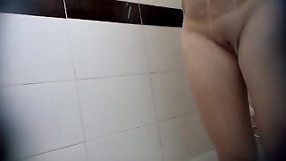 Voyeur big tits girl from 6969cams.com shaved pussy spy cam on shower