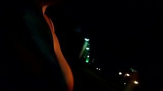 Riding around flashing my boobs at night