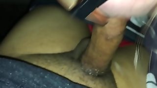 Giving a blowjob in a car