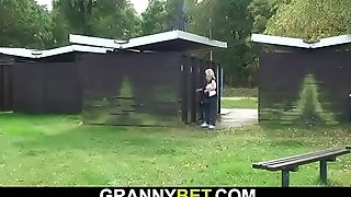 Busty blonde granny takes cock in the changing room
